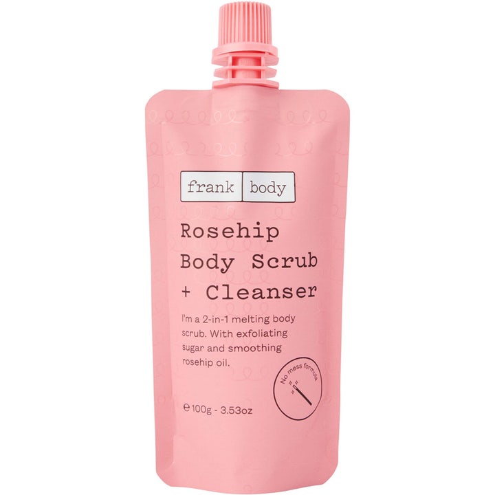 Frank Body Rosehip Body Scrub + Cleanser 100g 2-i-1 exfolierande kroppsskrubb med nyponolja i en rosa mjuk klämpåse.