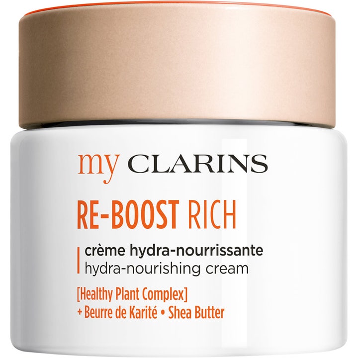 My Clarins RE-BOOST RICH Hydra-Nourishing Cream Clarins återfuktande ansiktskräm i vit burk med persikofärgat matt lock
