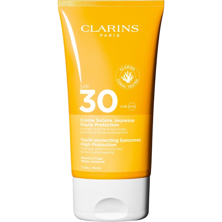 Clarins Youth-protecting Sunscreen SPF 30 solskydd som ger fukt och motverkar åldrande i orange tub med vitt lock