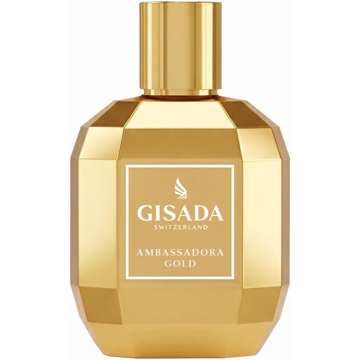 Gisada Ambassadora Gold 100 ml Eau de Parfum parfym i en guldfärgad facetterad glasflaska med matchande guldlock