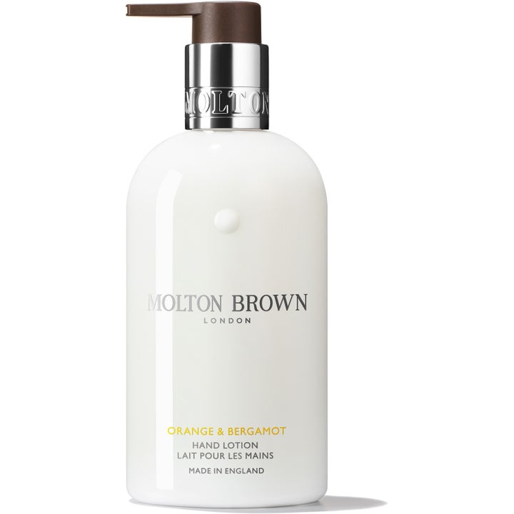 Molton Brown Orange & Bergamot 300ml handkräm apelsin bergamott i vit flaska med silverdetaljer och brun pump.