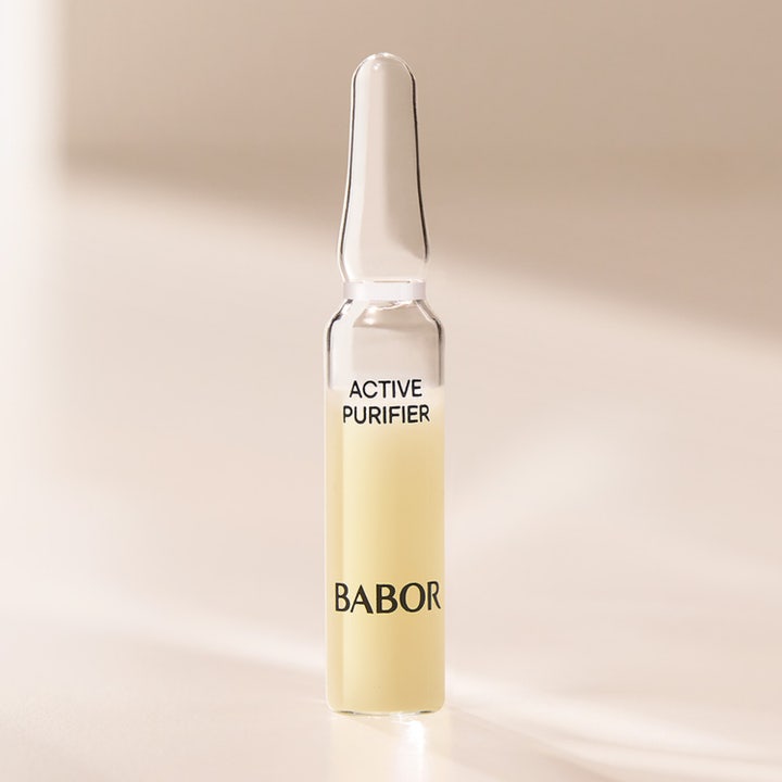 Babor Ampoule Active Purifier 14 ml serum mot finnar i en enskild glasampull med ljusgul vätska