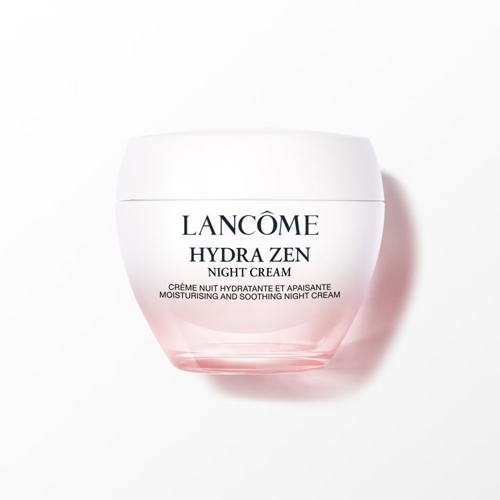 Lancôme Hydra Zen återfuktande nattkräm i en rundad glasburk med rosa färgton och vitt lock som ger lugnande vård.