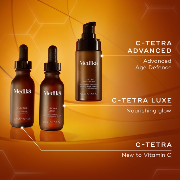 Medik8 C-Tetra Advanced 30 ml lystergivande ansiktsserum i brun pumpflaska bredvid C-Tetra Luxe och C-Tetra.