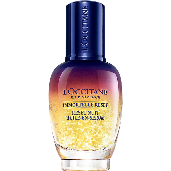 L'Occitane Immortelle Reset immortelle nattserum ger strålande hy i en lila glasflaska med gula oljekapslar