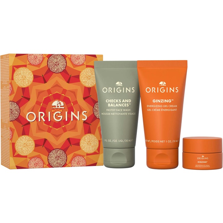 Origins Mini Travel Essentials energigivande hudvårdset med ansiktstvätt och krämer i orange och gröna tuber