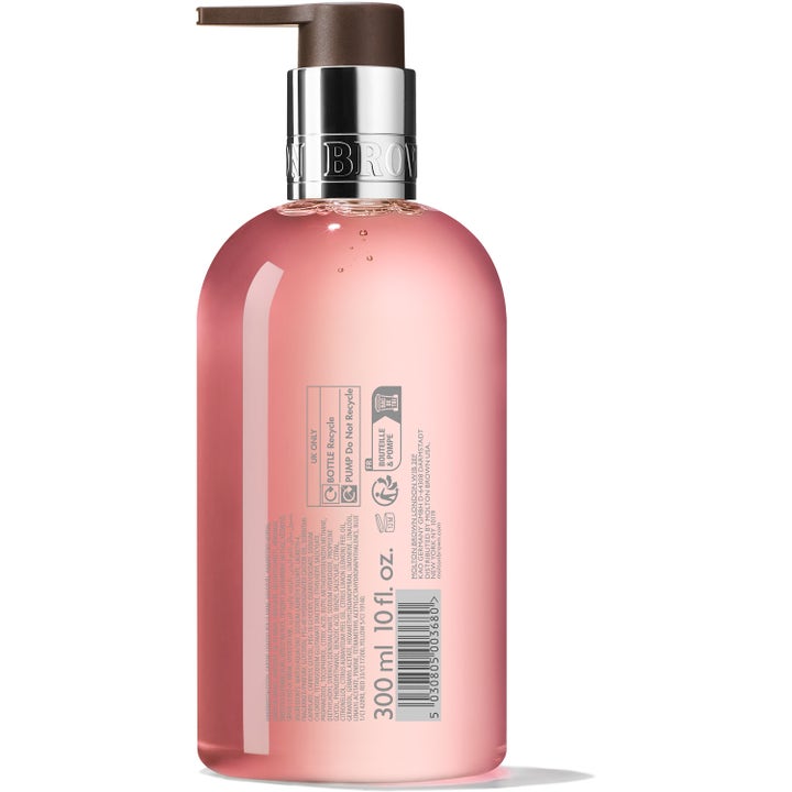 Molton Brown Delicious Rhubarb & Rose 300 ml handtvål i genomskinlig flaska med rosa gel och brun pump.