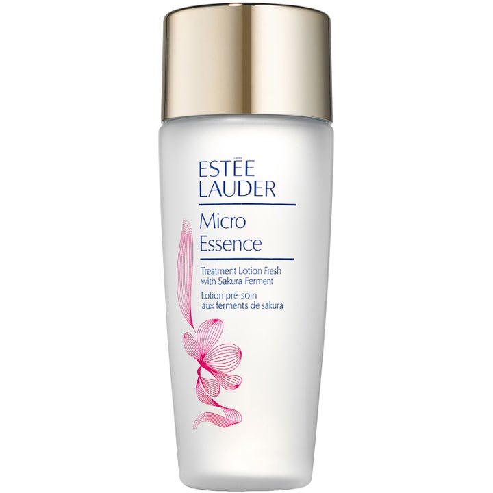 Estée Lauder Micro Essence Treatment Lotion Fresh återfuktande ansiktsvatten i frostad flaska med guldlock och rosa blomma