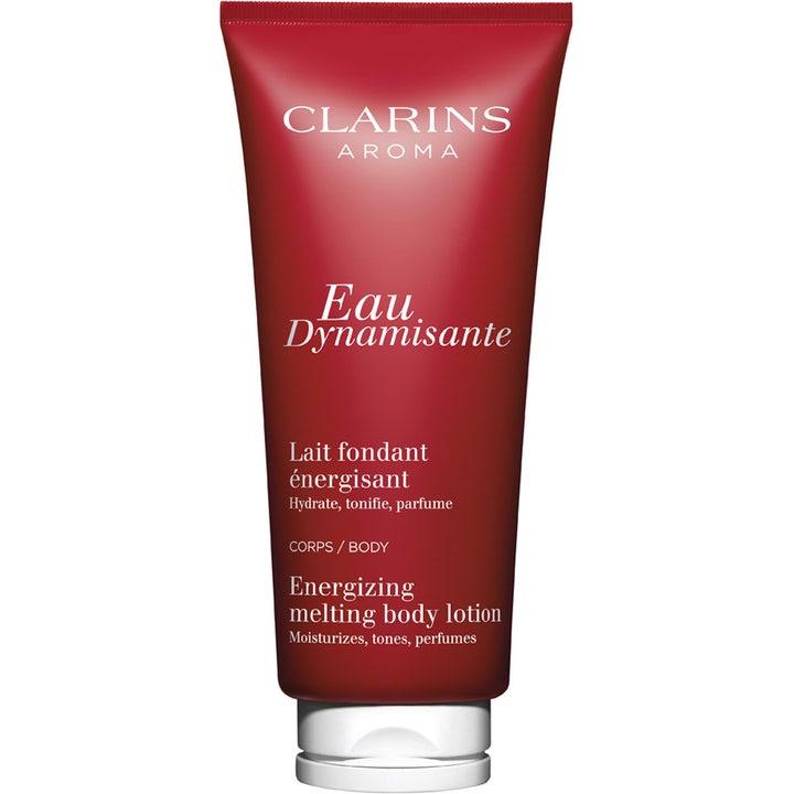 Clarins Eau Dynamisante 200 ml energigivande body lotion i en djupröd tub som återfuktar huden.