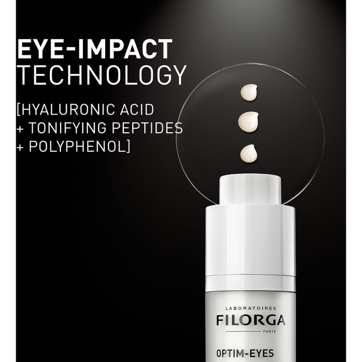 Filorga Optim-Eyes 15 ml 3-i-1 ögonkräm mot mörka ringar med hyaluronsyra visar tre krämiga droppar på glas.