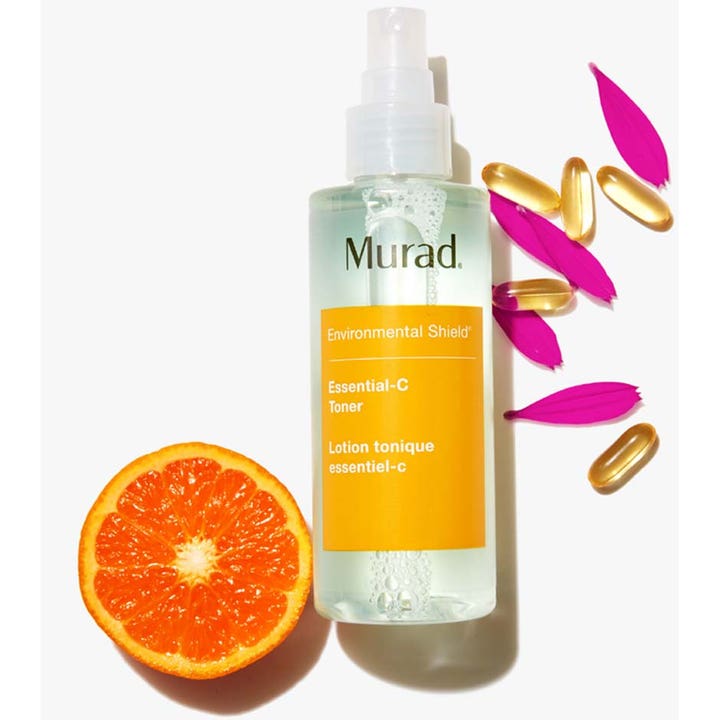 Murad Essential-C Toner 180 ml antioxidant toner hudvård i genomskinlig sprayflaska med skivad apelsin och kapslar