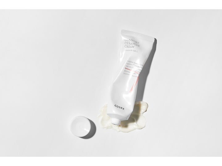 COSRX Balancium Comfort Ceramide Cream 80 ml återfuktande ansiktskräm för hudbarriären i vit tub med synlig kräm