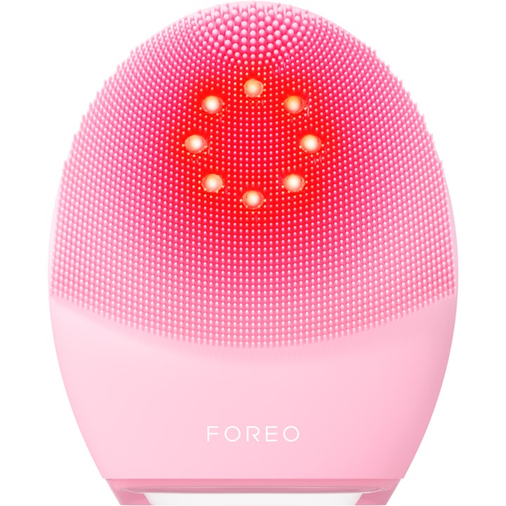 FOREO LUNA 4 plus elektrisk rengöringsborste för djuprengöring i rosa silikon med lysande röda LED-lampor.