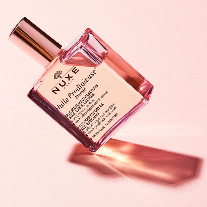 Nuxe Huile Prodigieuse Florale 100 ml vårdande ansiktsolja torr hud i rosa glasflaska med roséguldfärgad kork