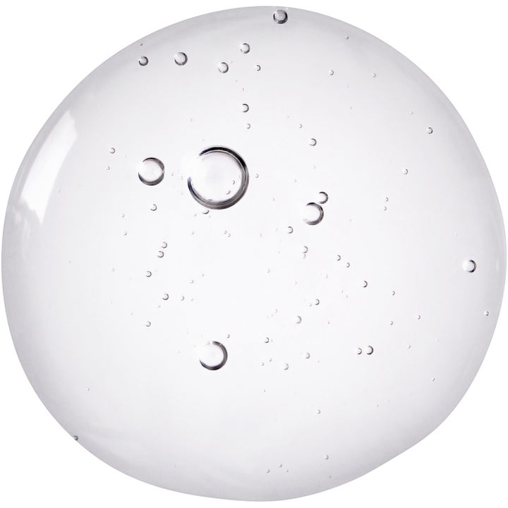 FAQ Swiss FAQ Red Light Peptide Serum 30 ml hudvård med en genomskinlig gel-konsistens och små luftbubblor.