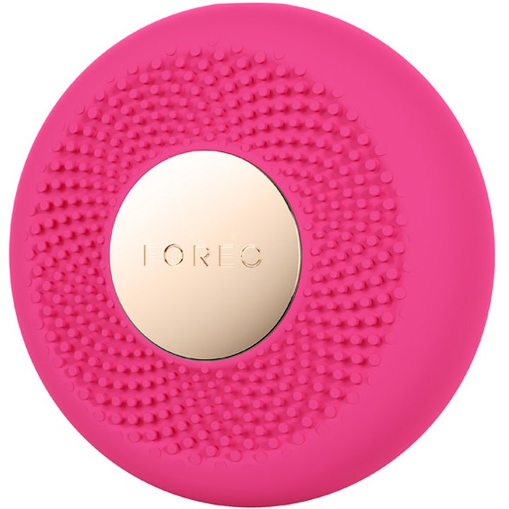 FOREO UFO 3 mini Fuchsia 1 st enhet för ljusbehandling i fuchsiafärgat silikon med elegant guldplatta.