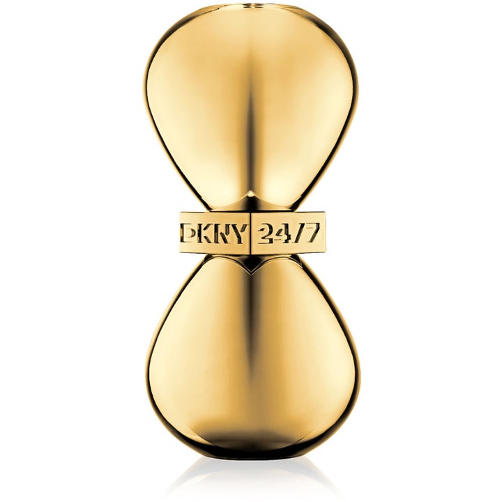 DKNY 24/7 Rush Eau de Parfum 100 ml parfym för dam i en timglasformad guldflaska med blank metallisk yta