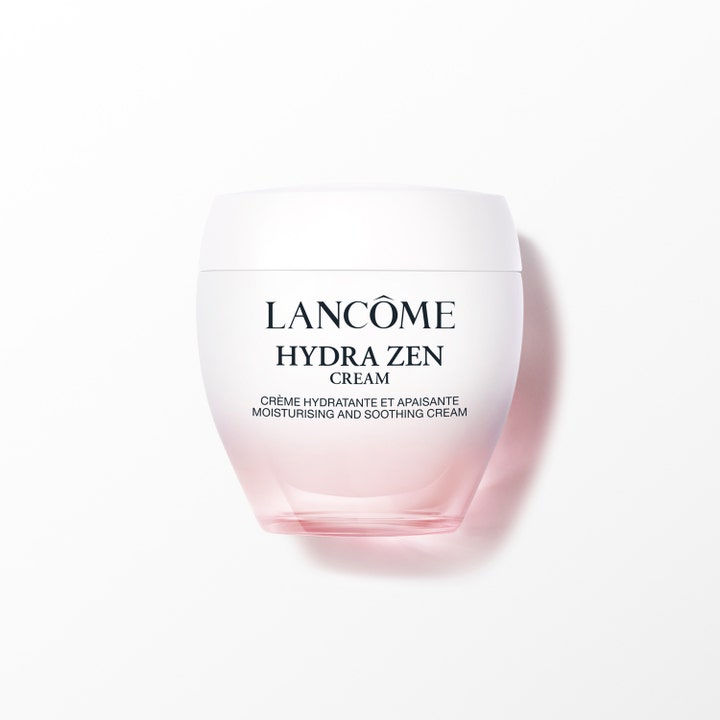 Lancôme Hydra Zen Cream lugnande och återfuktande ansiktskräm i en ljusrosa tonad glasburk med vitt lock.