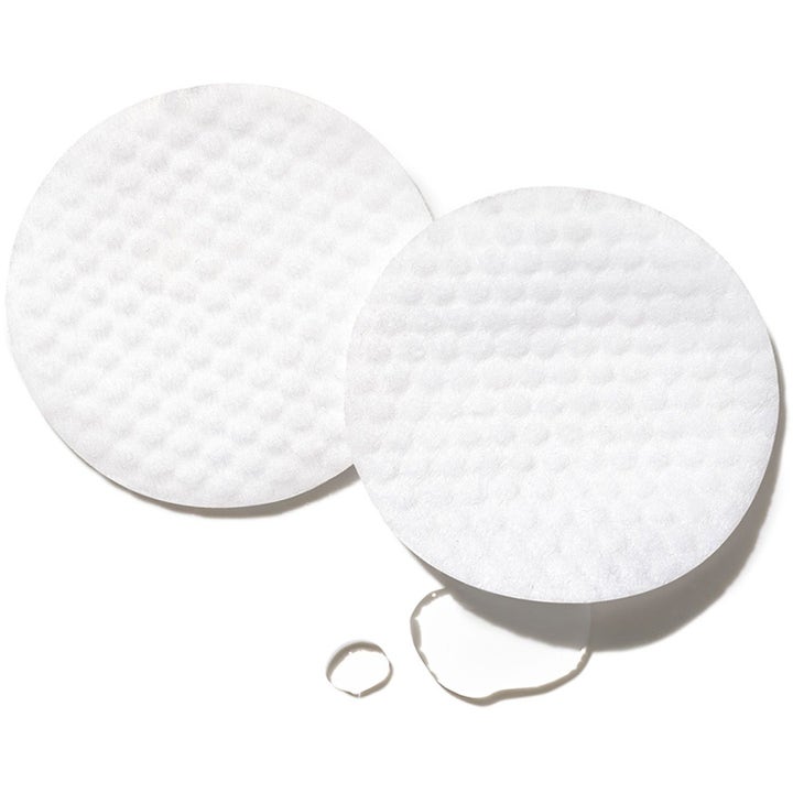 Exuviance Peeling Power ansiktspeeling för exfoliering visar två vita strukturerade pads och klar vätska