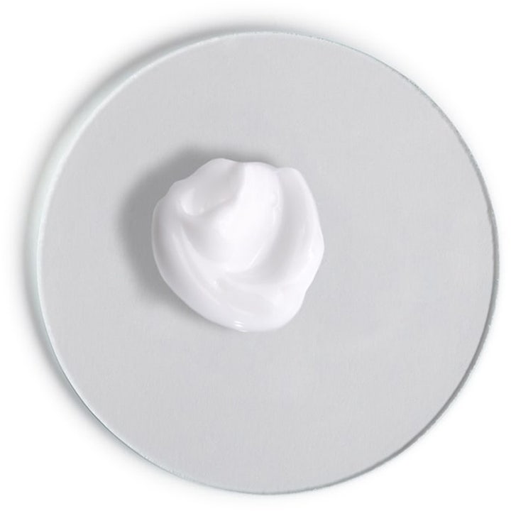Comfort Zone Hydramemory Light Sorbet Cream 60 ml fuktkräm visar en mjuk vit krämig textur på en rund glasskiva.