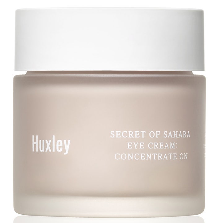 Huxley Secret of Sahara Eye Cream Concentrate On 30 ml ögonkräm mot påsar i en frostad glasburk med vitt lock.