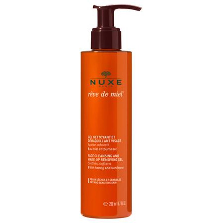 Nuxe Rêve de Miel 200 ml lugnande ansiktsrengöring med honung i en bärnstensfärgad plastflaska med mörkbrun pump.