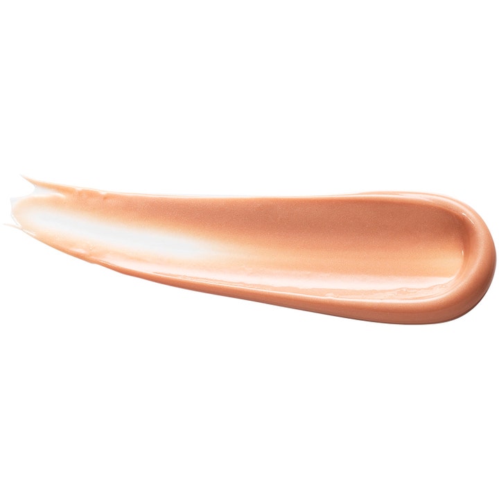 Origins GinZing Brightening Eye Cream 15 ml är en Origins ögonkräm mot svullnad med en persikofärgad skimrande textur.