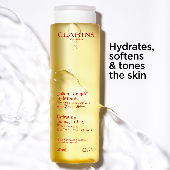 Clarins Hydrating Toning Lotion 200 ml gul flaska med aloe vera som ger fukt och mjukgör huden i vattenstänk