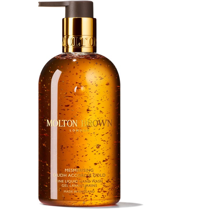 Molton Brown Mesmerising Oudh Accord & Gold 300 ml exklusiv handtvål med oud i flaska med guldglitter