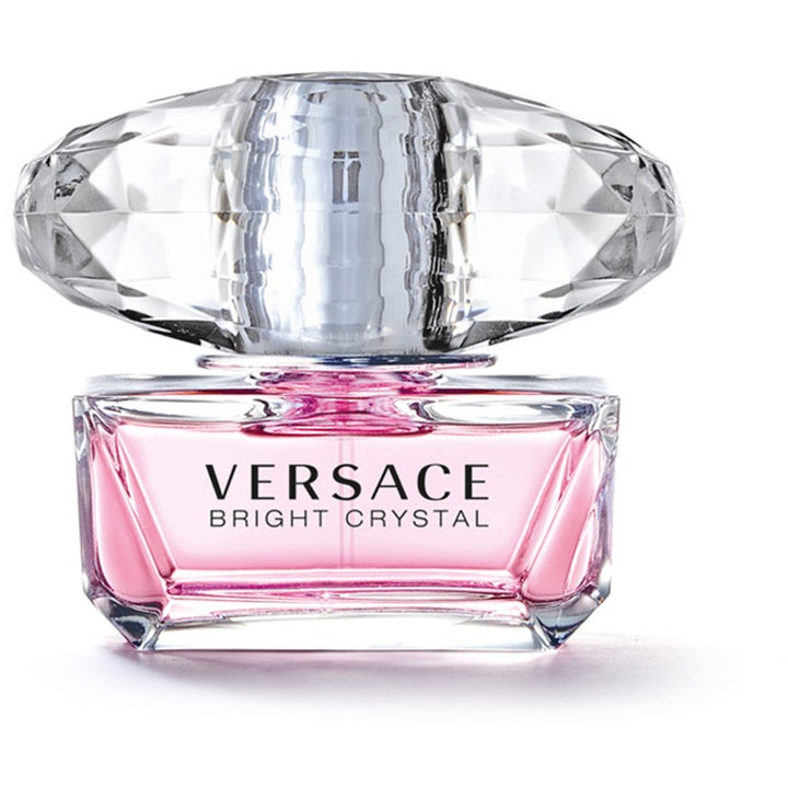 Versace Bright Crystal blommig parfym i elegant glasflaska med rosa vätska och stor slipad kristallkork.