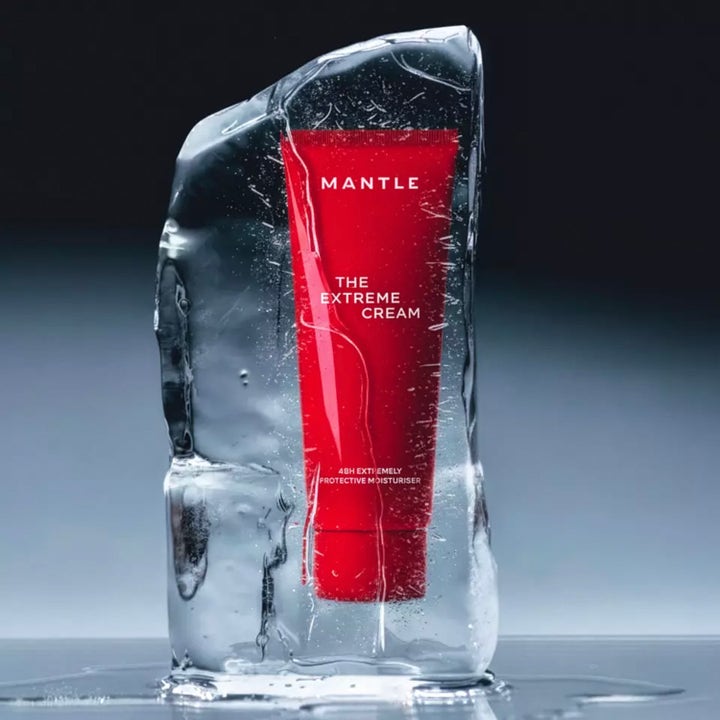 MANTLE The Extreme Cream 50 ml skyddande ansiktskräm i röd tub inuti ett block av is för extremt väder