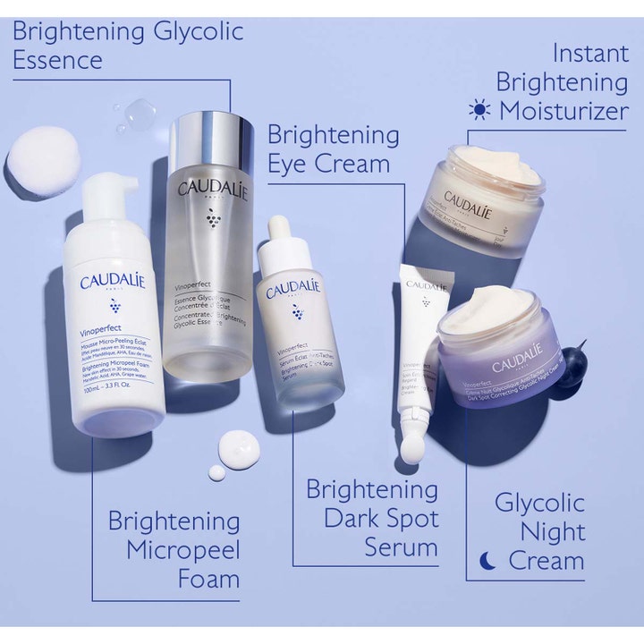 Caudalie Vinoperfect Concentrated Glycolic Essence 100 ml lystergivande essence i frostat glas med hela hudvårdsserien.