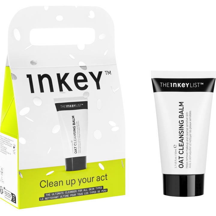 The Inkey List Oat Cleansing Balm 50 ml lugnande rengöring i vit tub bredvid dekorativ presentförpackning