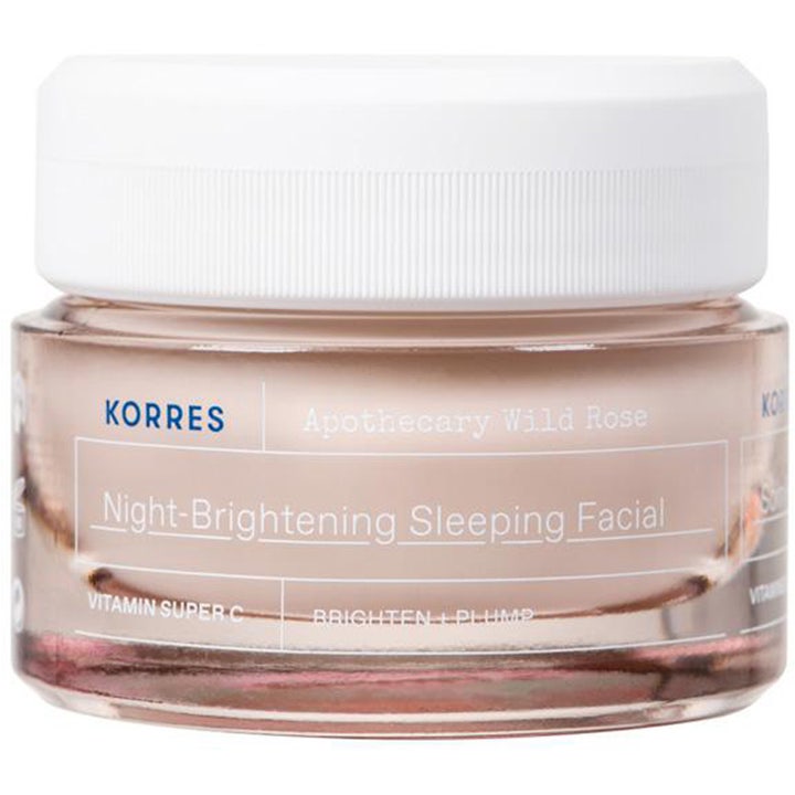 Korres Apothecary Wild Rose Night-Brightening Sleeping Facial nattkräm ger lyster i rosa glasburk med vitt lock.