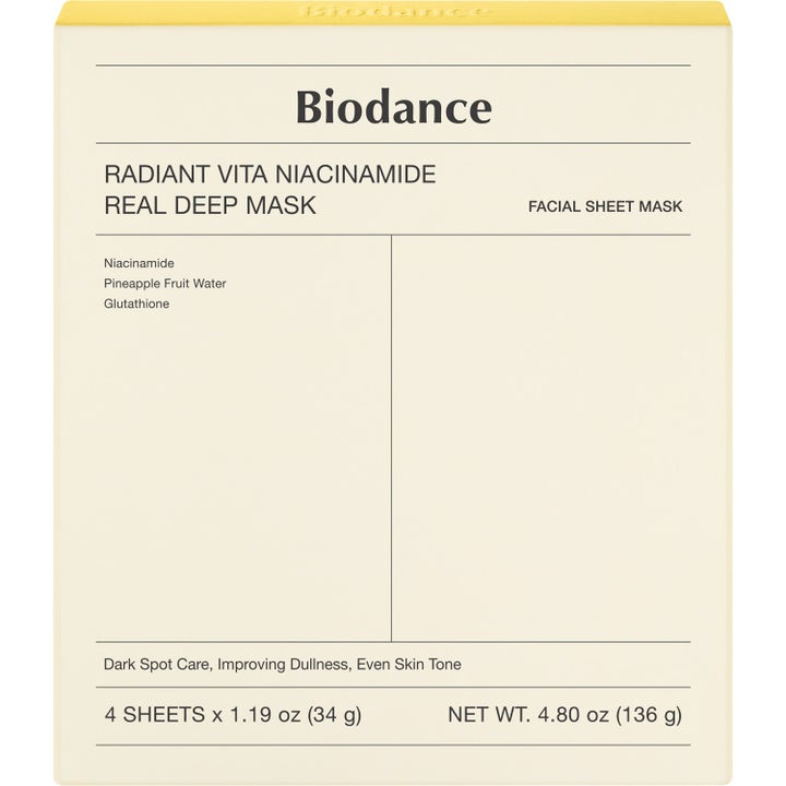 Biodance Radiant Vita Niacinamide Real Deep Mask 4-pack lystergivande ansiktsmask i krämfärgad och gul förpackning.
