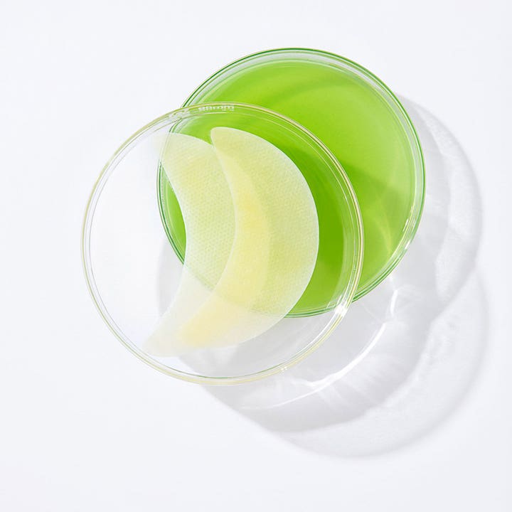 Murad Retinol Youth Renewal Eye Mask 5 st föryngring ögonmask med ljusgula patches i en klar glasskål
