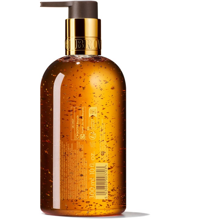 Molton Brown Mesmerising Oudh Accord &amp; Gold 300 ml exklusiv handtvål med oud och guldflagor i transparent flaska