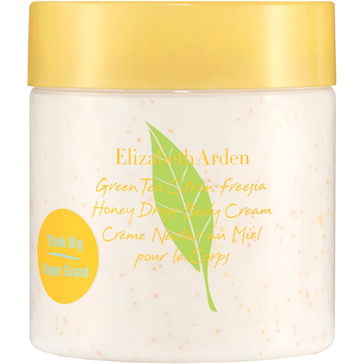 Elizabeth Arden Green Tea Citron Freesia Honey Drops Body Cream ger fukt i vit burk med gult lock och synliga honungspärlor