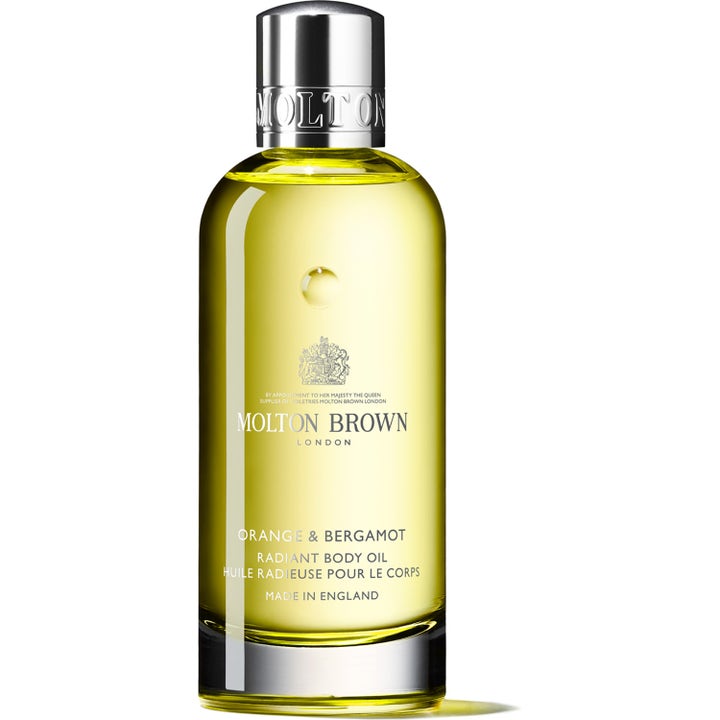 Molton Brown Orange & Bergamot Body Oil 100 ml citrus kroppsolja för torr hud i glasflaska med silverkork och gul olja.