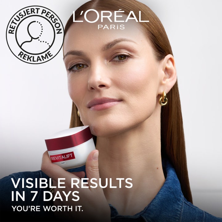 L'Oréal Paris Revitalift Day Cream 50 ml rynkkräm i vit glasburk med krämig textur och rött lock.