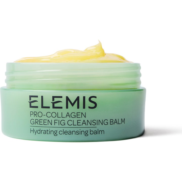 Elemis Pro-Collagen Green Fig Cleansing Balm är ett elemis rengöringsbalm i grön burk med gul krämig textur.