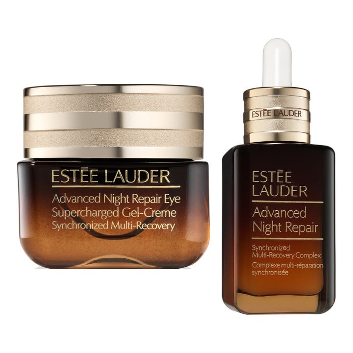 Estée Lauder Advanced Night Repair Set med ögonkräm och serum i bruna glasflaskor med gulddetaljer.