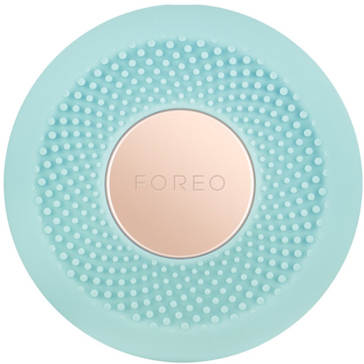 FOREO UFO 2 Mint hudvårdsenhet för ansiktsmasker i en rund mintgrön silikondesign med lyxig guldplatta