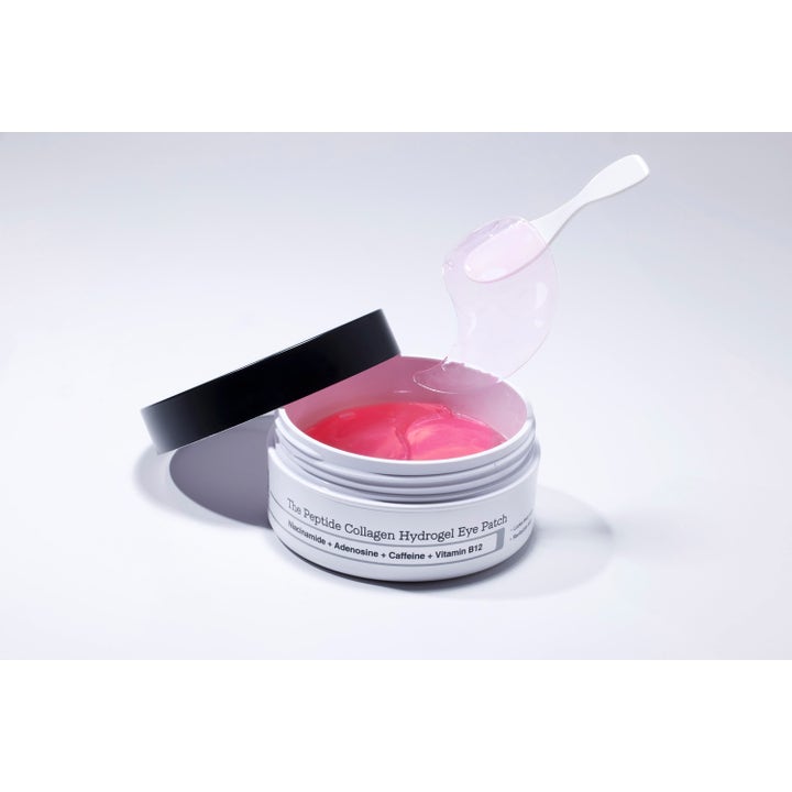 COSRX The Peptide Collagen Hydrogel Eye patch 60 st K-beauty ögonmask med rosa hydrogelpatches och vit spatel.
