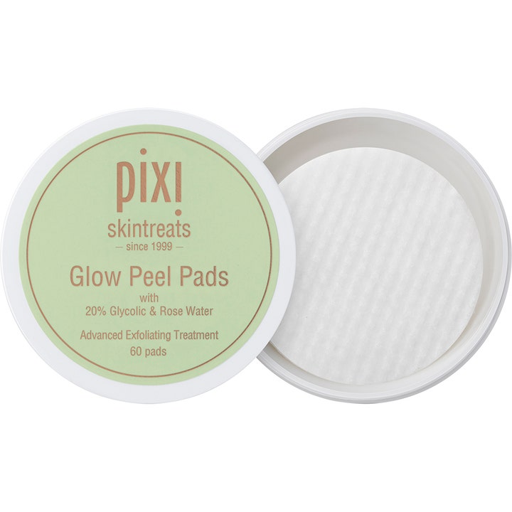 Pixi Glow Peel Pads 60 st exfolierande behandling glykolsyra i en öppen vit burk med runda mönstrade peeling pads.