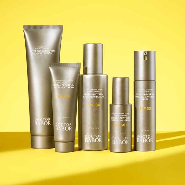 Babor DOC Broad Spectrum Hydration Lotion SPF 30 150 ml återfuktande dagkräm i guldflaska på gul bakgrund.