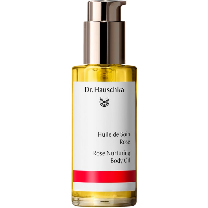 Dr. Hauschka Rose Nurturing Body Oil 75 ml intensivt närande kroppsolja i glasflaska med guldpump och gyllene olja.