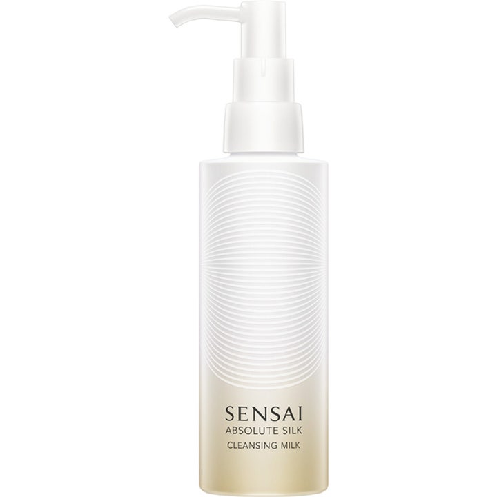 Sensai Absolute Silk Cleansing Milk 150 ml mjukgörande rengöringsmjölk i vit pumpflaska med guldtonad botten.