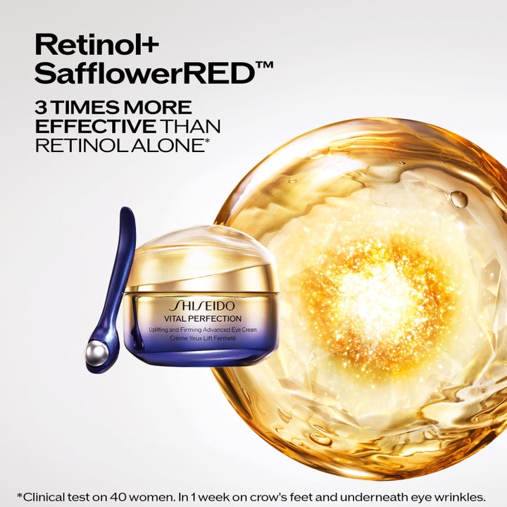Shiseido Vital Perfection Eye Cream 15 ml med Retinol+ mot rynkor framför en gyllene oljedroppe