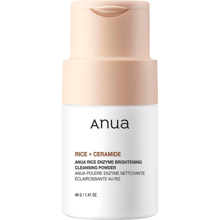 Anua Rice Enzyme Brightening Cleansing Powder 40 g lystergivande pulverrengöring i vit flaska med persikofärgat lock
